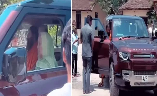 Ramdev Seen Driving Land Rover Defender 130 Video Goes Viral - Sakshi