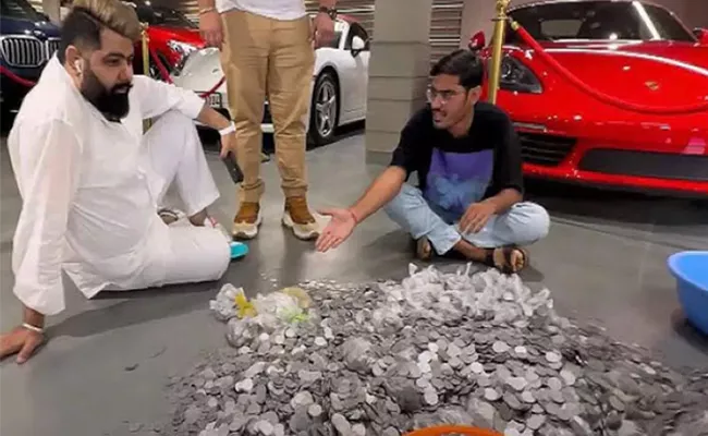 Indian Youtuber bought Porsche 718 Boxster Rs 1 crore with rs 1 coins - Sakshi