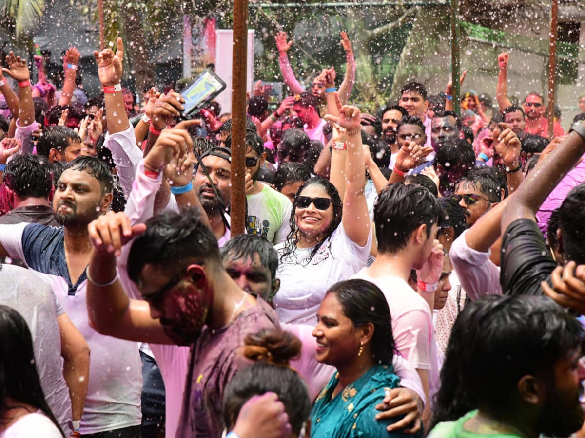 Holi Celebrations at Vizag RK Beach - Sakshi