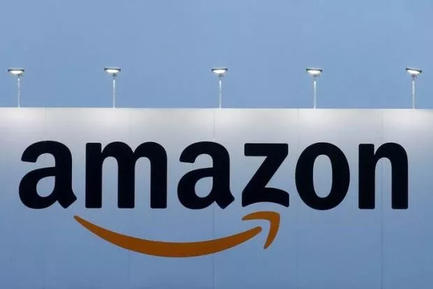 Amazon posts largest profit in its history on sales, tax boost - Sakshi