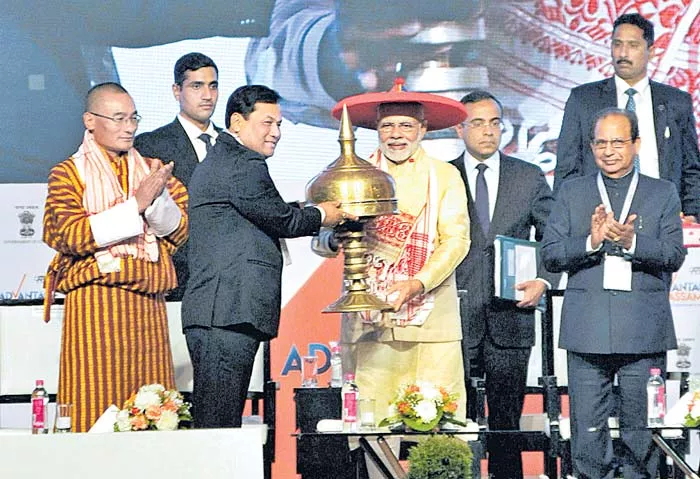 PM Modi arrives in Guwahati to inaugurate Global Investors' Summit 'Advantage Assam' - Sakshi