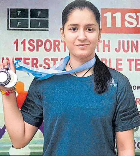 Naina Jaiswal wins Silver and bronze in Table Tennis Championship - Sakshi