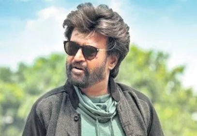 Rajinikanth to join hands with his son-in-law Dhanush and karthik subbaraj - Sakshi