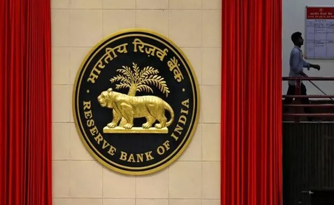 RBI may cut interest rates by 40 basis points before this fiscal-end Fitch - Sakshi
