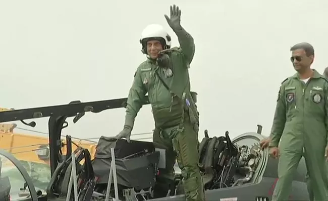 Rajnath Singh Flies In Fighter Jet Tejas - Sakshi