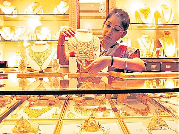 Observers opinion on gold in the near future  - Sakshi