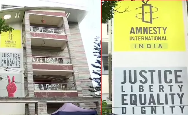 CBI raids Amnesty International India office in Bengaluru - Sakshi