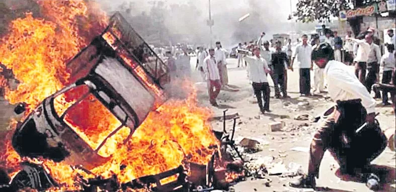 Nanavati panel gives clean chit to then CM Modi in Gujarat riots - Sakshi