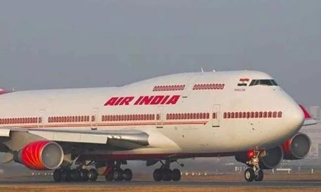Passengers threaten to open cockpit door on AI flight - Sakshi