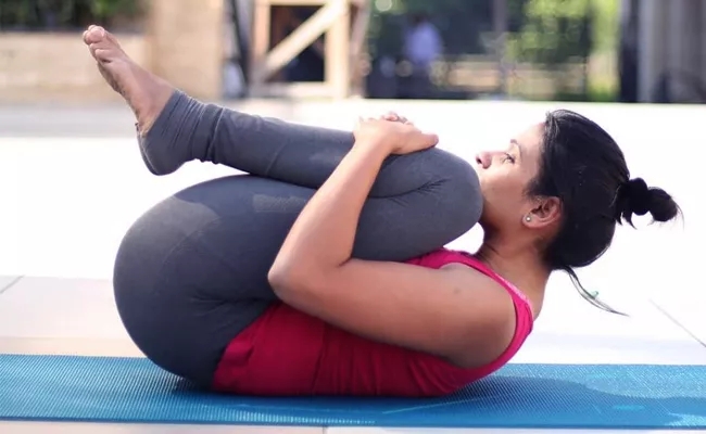 Reduce Belly Fat With Pawanmuktasana - Sakshi