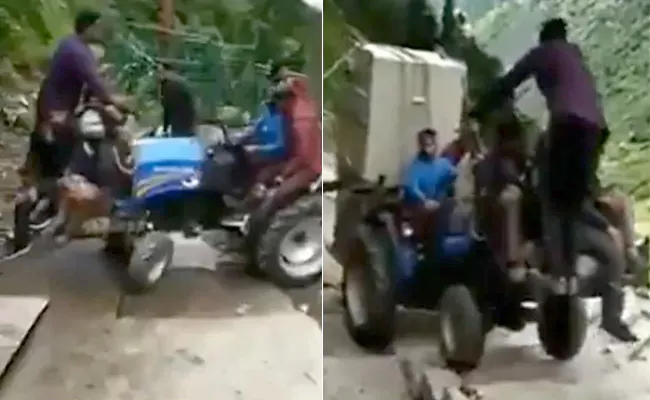 Viral Video Shows Tractor Climbing Stairs At Kedarnath - Sakshi