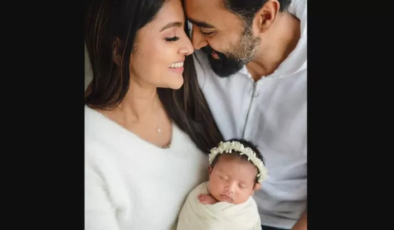 Sneha Introduces Daughter Aadhyantaa on Husband Birthday - Sakshi
