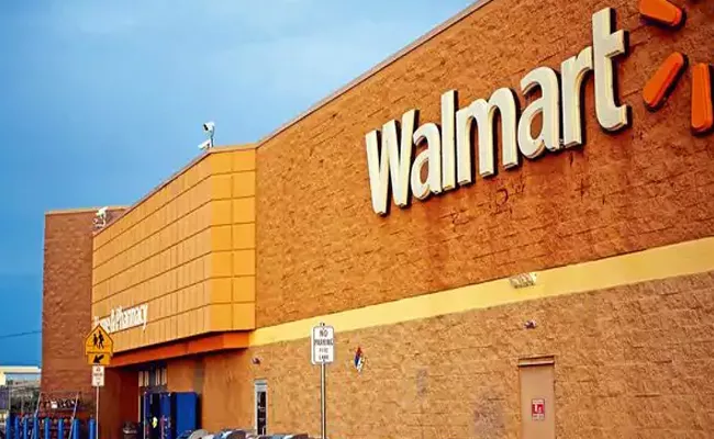Walmart looks to join hands with Tata group in retail push - Sakshi