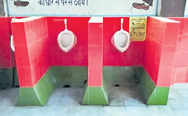 Samajwadi Party Color To Railway Toilets In UP - Sakshi