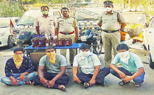 Teachers caught selling illegal alcohol - Sakshi