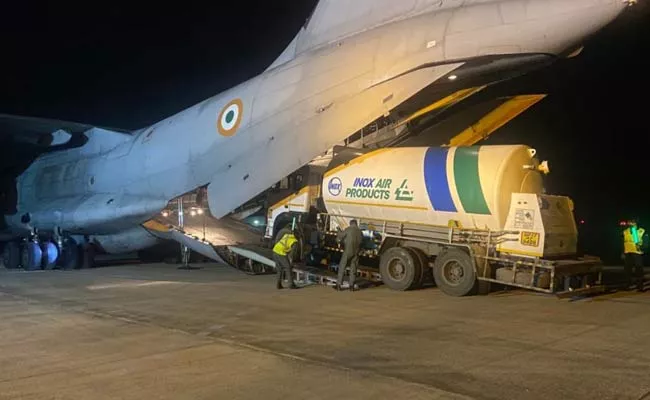 Oxygen tankers Reached To India From Bangkok - Sakshi