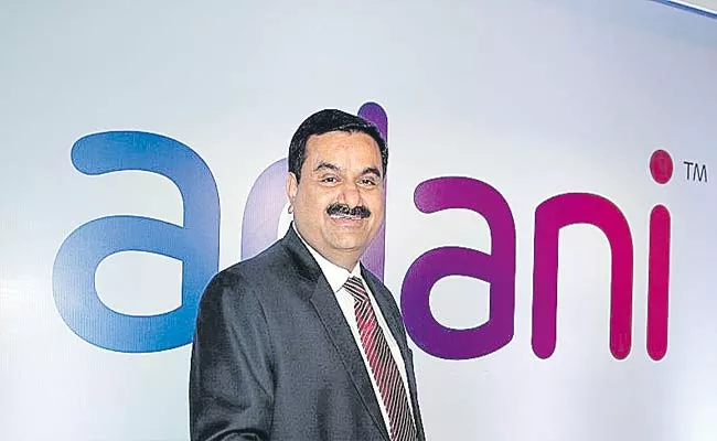 Adani Group Company To Cross 100 Billion In Market Value - Sakshi