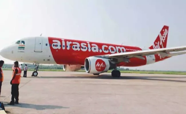 Man Asked AirAsia Crew For Italian Smooch Mid Air Stripped - Sakshi