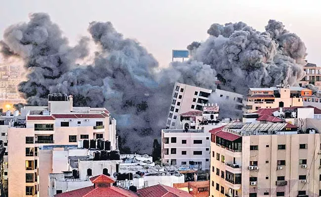 Hamas fires rockets after Israel destroys third Gaza tower - Sakshi