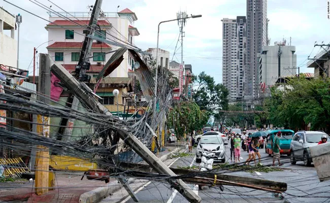 Philippines Super Typhoon Rai death toll surges - Sakshi