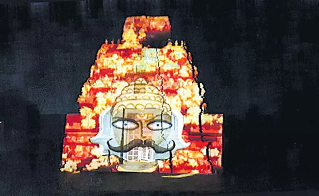 Ramayana Images Were Projected Through Projector On The North Rajagopuram - Sakshi