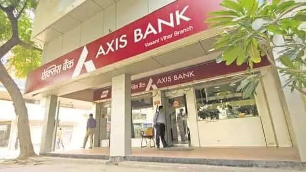 Axis Bank hikes average balance requirement cuts free cash transaction limit - Sakshi