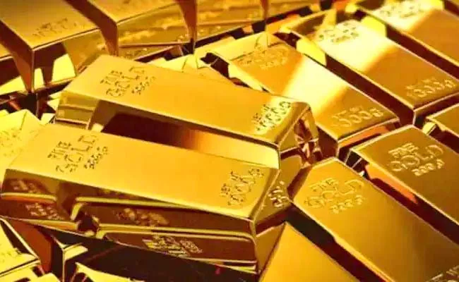 Centre hikes import duty Gold price rises - Sakshi