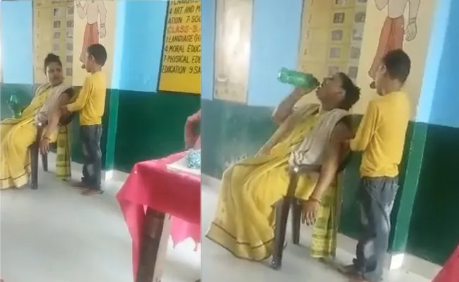 UP Teacher Suspended After Massaging Video Goes Viral - Sakshi