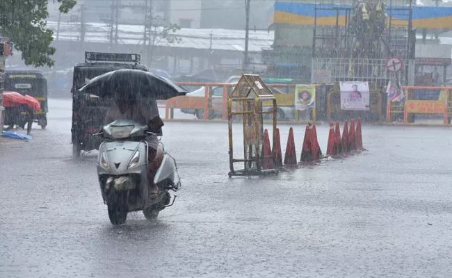 Red Alert Issued in Mumbai Karnataka Heavy Rainfall continues Udipu - Sakshi