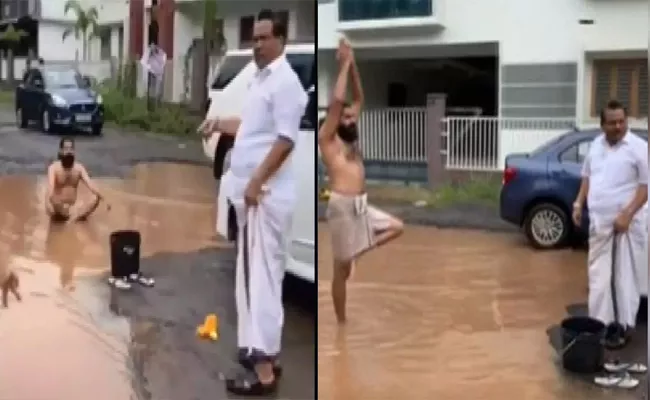 Mud bath, Yoga: Kerala Man Unique Protest Against potholes On Roads - Sakshi