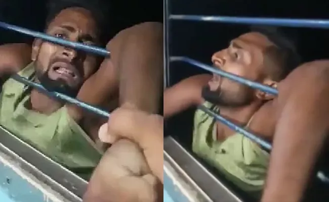 Viral Video: Bihar Thief Dangles On Train Window As passengers Grab arms - Sakshi