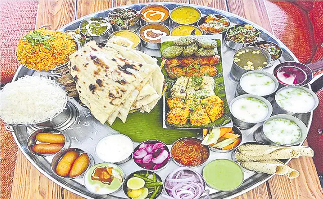 Delhi Restaurant To Offer 56 dishes Thali For PM Narendra Modi Birthday - Sakshi
