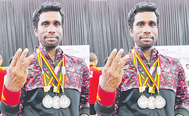 Dinesh Rajaiah Wins Para Badminton silvers In Uganda - Sakshi