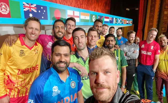 T20 World Cup 2022: ICC Share Pic 16 Teams Captains Pose With Trophy - Sakshi