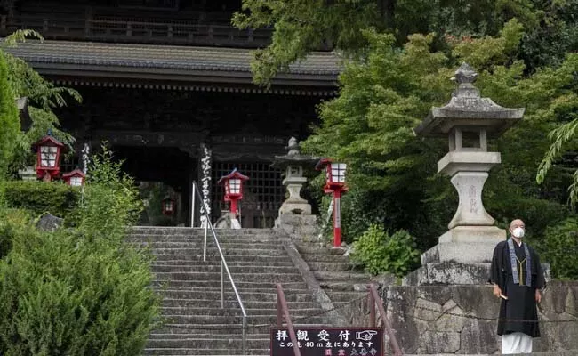 Buddhist Temple In Japan Offerings Wine Bottles - Sakshi