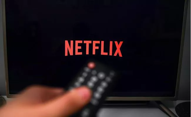 Netflix Announced To Charge Extra Fee From Users - Sakshi