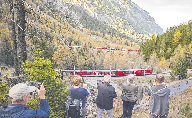 Switzerland claim record for world longest passenger train - Sakshi