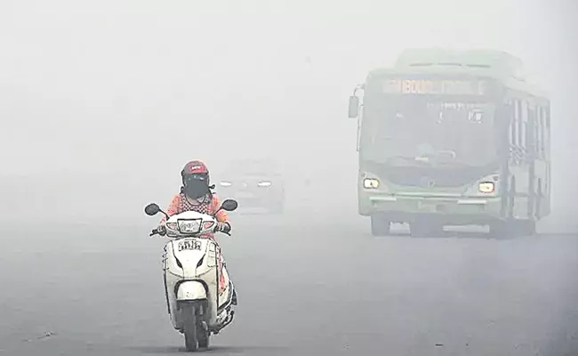 Delhi air pollution: Indian capital battles dangerous levels of air pollution - Sakshi