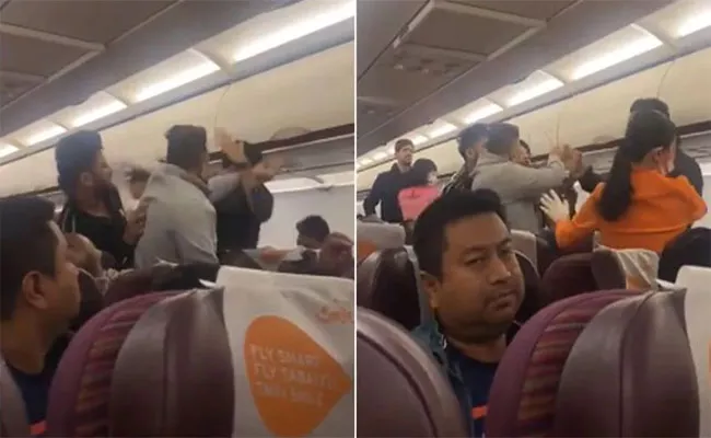 Video: Passengers get into Fight On Bangkok Kolkata Flight - Sakshi