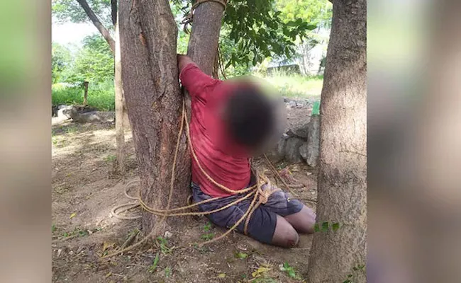 TN Crime: Workers tie theft suspect to tree beat him to death - Sakshi