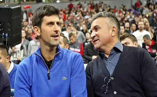 Controversy: Novak Djokovic Father Poses With Russian Flag AUS Open - Sakshi