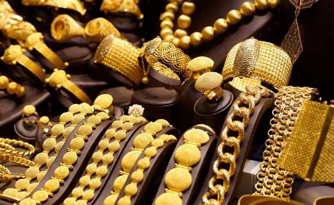 Gold prices today hit fresh record high what leads to rally - Sakshi