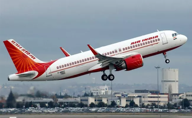 Man Smokes On Air India London-mumbai Flight, Tried To Open Aircraft Door - Sakshi