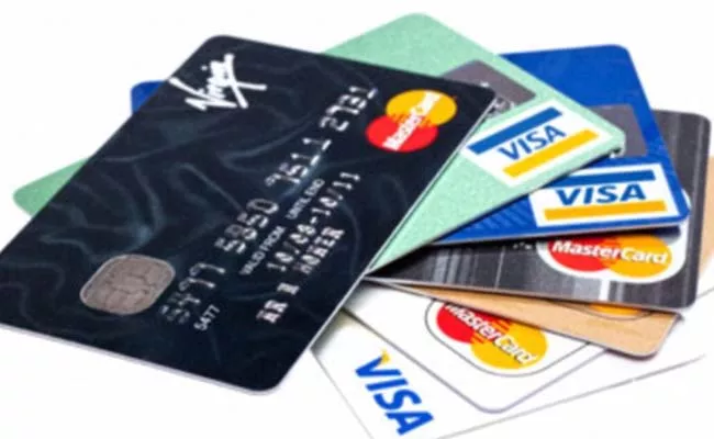 Do you Know Many Banks offers free accident Life Insurance with debit cards - Sakshi