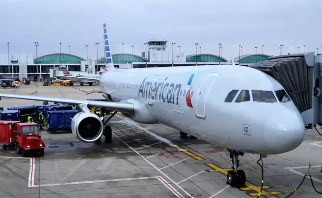 Passenger Urinated New York Delhi American Airlines Flight - Sakshi