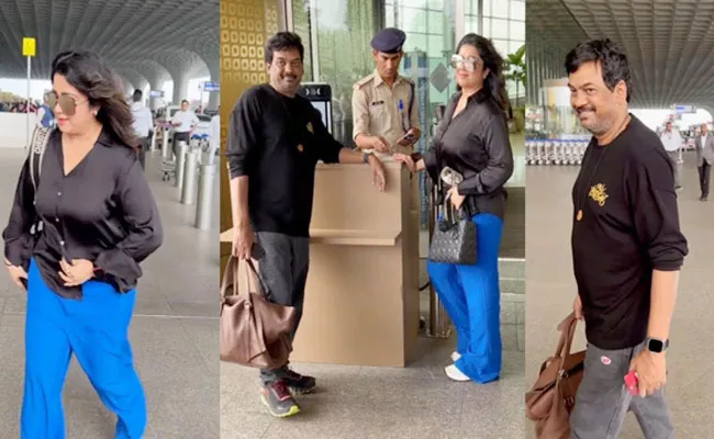 Puri Jagannadh And Charmi Kaur Spotted At Mumbai Airport - Sakshi