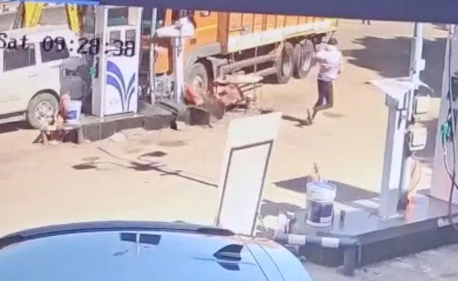 Viral Video: Truck Loses Control During Petrol Pump Entry - Sakshi