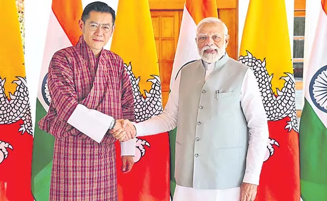PM Modi holds talks with Bhutan King - Sakshi