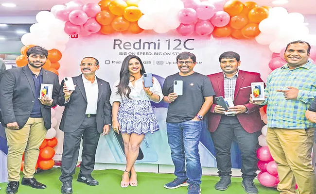 Redmi 12C series phones at Be New Mobiles Store - Sakshi