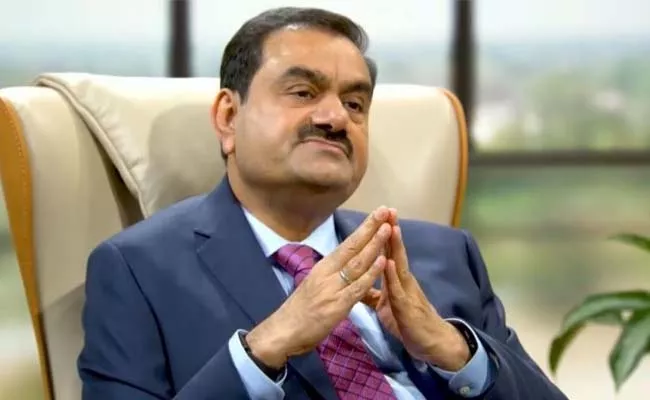Adani planning to raise Rs 21k crore from stake sale in two group firms - Sakshi